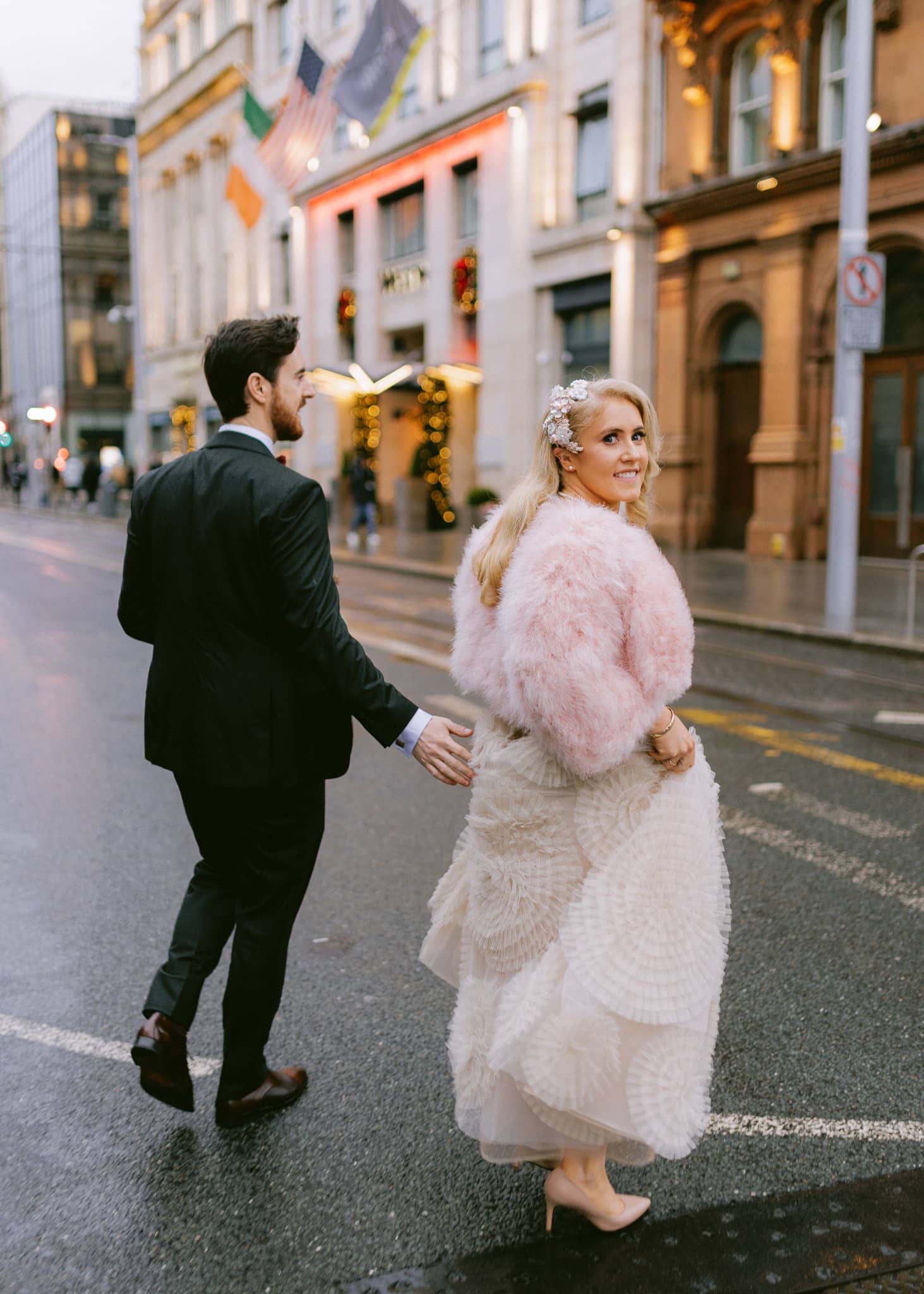 Dublin Westin Hotel Wedding Bride and groom walking towards hotel
